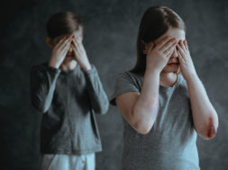 Frightened siblings crying