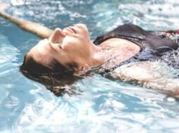 Woman enjoying the water in a swimming pool