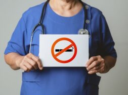 quit-smoking-no-tobacco-day-doctor-holding-no-smoking-sign_61573-2750