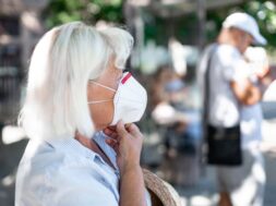 caucasian-blond-woman-wearing-protective-mask-against-new-2019-ncov-coronavirus-public-train-station_68196-4013