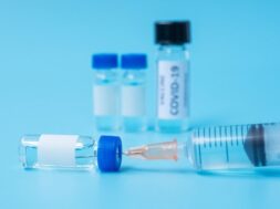 covid-19-vaccine-vial-injection-needle-syringe-against-coronavirus-infection-hospital-laboratory-medical-health-vaccination-immunization-concept_42256-3468