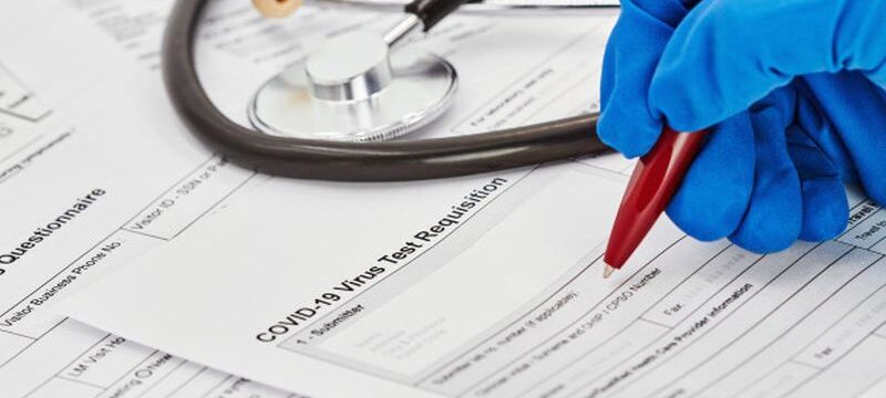 doctor-blue-medical-gloves-is-getting-ready-fill-out-virus-test-requisition-form-stethoscope-background-closeup_98862-479