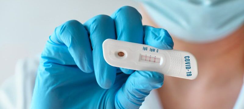 doctor-shows-rapid-laboratory-covid-19-test-detection-igm-igg-antibodies-novel-coronavirus-sars-cov-2-with-positive-result-herd-immunity-protects-population-from-this-new-virus_87646-7005