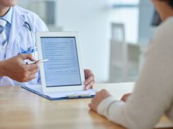 doctor-with-digital-tablet_1098-18240