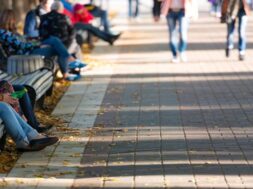 motion-blurred-pedestrians-park-street-background-with-copyspace_104337-222