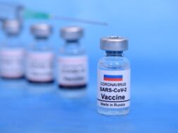 russian-vaccine-healthcare-medical-concept-vaccines-syringe-blue-background-prevention-immunization-treatment-from-corona-virus-infection_181242-691