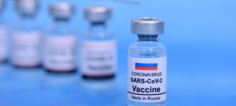 russian-vaccine-healthcare-medical-concept-vaccines-syringe-blue-background-prevention-immunization-treatment-from-corona-virus-infection_181242-691