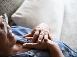 sick-asian-old-woman-lying-sofa-having-pain-heart_53476-4904