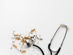 top-view-stethoscope-with-cigarettes_23-2148160859
