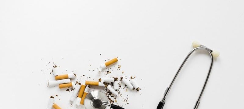 top-view-stethoscope-with-cigarettes_23-2148160859