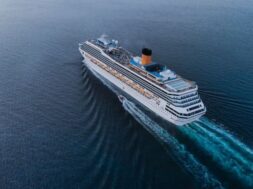aerial-view-beautiful-white-cruise-ship-luxury-cruise-concept-tourism-travel-h_33850-121