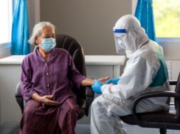 asian-doctor-is-checking-patience-s-pulse-by-fingers-medical-checking-table-aging-female-patient-that-is-risk-infection-corona-virus-covid-19_61243-746