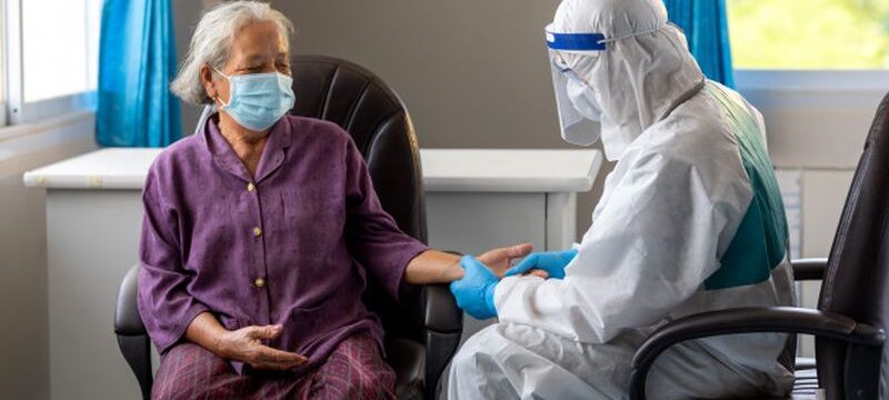 asian-doctor-is-checking-patience-s-pulse-by-fingers-medical-checking-table-aging-female-patient-that-is-risk-infection-corona-virus-covid-19_61243-746