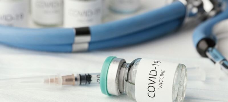 assortment-with-coronavirus-vaccine-bottle_23-2148920167