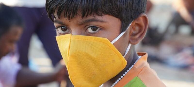 boy-wearing-mask-because-his-safe-corona_181020-103