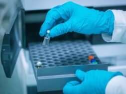 close-up-pharmacist-hands-with-developed-vaccine-against-coronavirus-covid-2019-production-develop-coronavirus-vaccine_310913-802