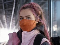 close-up-woman-wearing-mask_23-2148927268