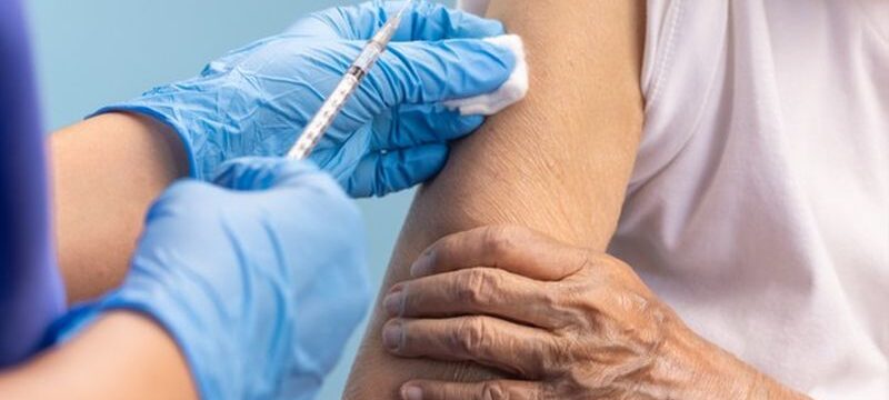 closeup-nurse-doing-vaccine-injection-senior-woman_176124-716