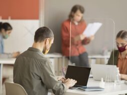 co-workers-wearing-face-mask-work_23-2148727682