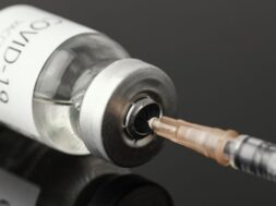 coronavirus-vaccine-bottle-assortment_23-2148920193