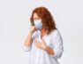 covid-19-social-distancing-coronavirus-self-quarantine-people-concept-sick-middle-aged-redhead-woman-coughing-wearing-medical-mask-having-sour-throat-disease-symptoms-caught-influenza_1258-21474
