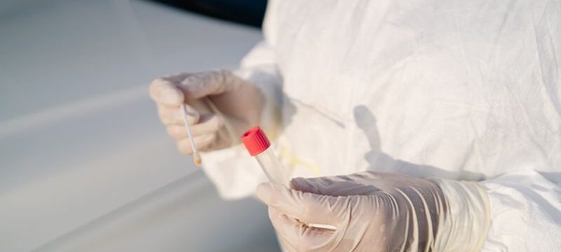 doctor-doing-pcr-test-covid-19-patient-through-car-window_147764-740