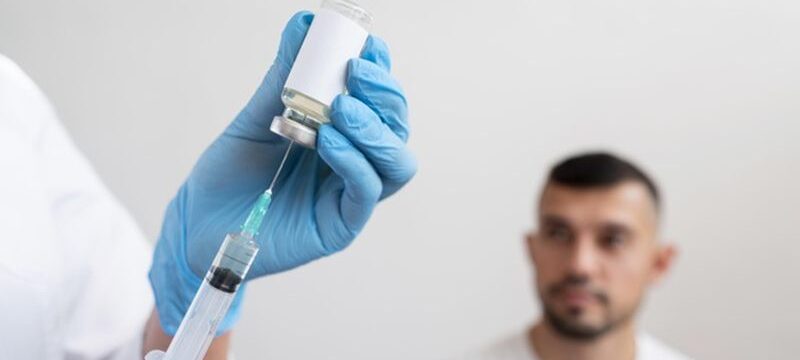 doctor-getting-ready-vaccine-patient_23-2148803368