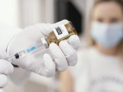 doctor-getting-ready-vaccine-patient_23-2148920133