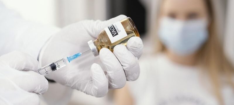 doctor-getting-ready-vaccine-patient_23-2148920133