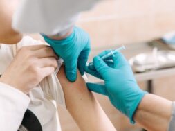 doctor-making-vaccine-pacient-using-syringe_296728-175