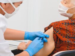 elderly-woman-getting-coronavirus-vaccine_97875-522