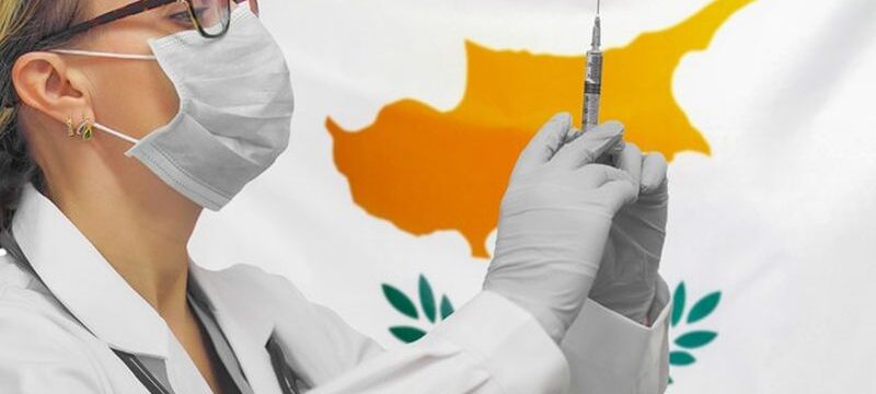 female-doctor-nurse-gloves-holding-syringe-vaccination-against-cyprus-flag_156719-731