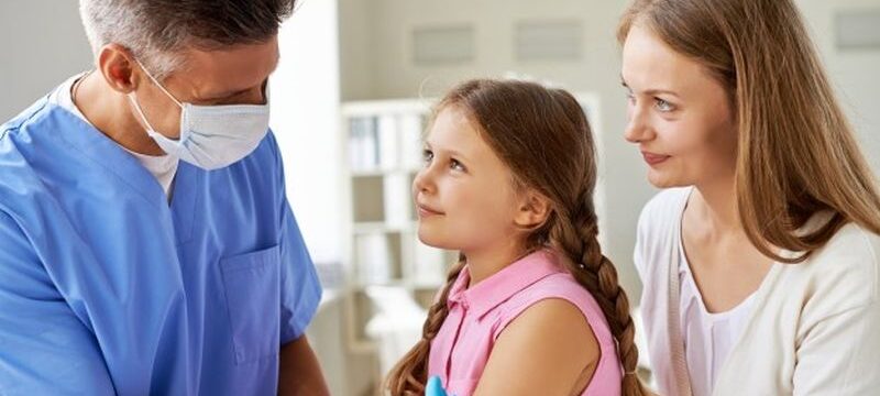 girl-receiving-vaccine-medical-office_1098-380