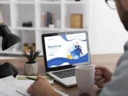 man-desk-with-laptop-mock-up_23-2148782213