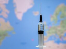medical-syringe-vaccine-world-map_367038-335