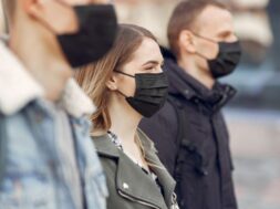 people-masks-stands-street_1157-31567