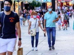 people-walk-comercial-street-named-meritxell-after-covid19_181624-28812