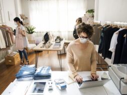 people-wearing-mask-clothing-store-shopping-new-normal_53876-96179