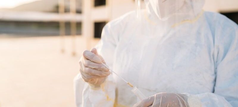 portrait-young-woman-medical-worker-uses-pcr-test-person-inside-car_147764-746