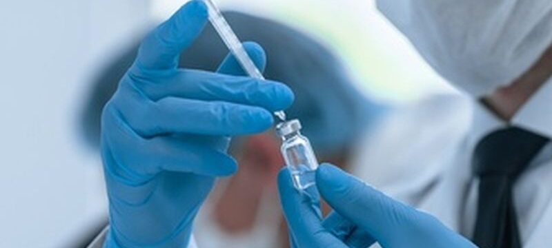 close-up-group-scientists-conducting-trials-new-vaccine-photo-with-copy-space_160672-85