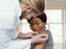 close-up-woman-getting-vaccinated_23-2148894866