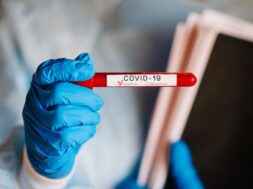 coronavirus-hands-doctor-nurse-protective-suit-hold-test-tube-with-biological-sample-covid-19-conduct-laboratory-test-positive-result-blood-is-infected-new-cases-infection_180731-140