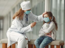 doctor-child-protective-masks-are-hospital_1157-31408