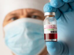 doctor-medical-mask-with-bottle-effective-vaccine-against-coronavirus-disease_123211-798