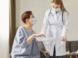 elder-patient-with-medical-mask-covid-recovery-center-female-doctor-look-together-results_23-2148847861