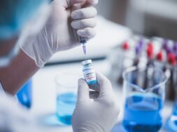 fight-against-covid-19-coronavirus-vaccine-research-laboratory-professional-scientists-holds-syringe-bottle-vaccine-virus-cure-treatment-injection-medicine-clinical-during-pandemic_33755-8496