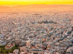 greece-warm-summer-evening-rooftops-athens-residential-buildings-narrow-streets_356860-674
