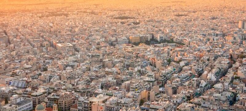 greece-warm-summer-evening-rooftops-athens-residential-buildings-narrow-streets_356860-674