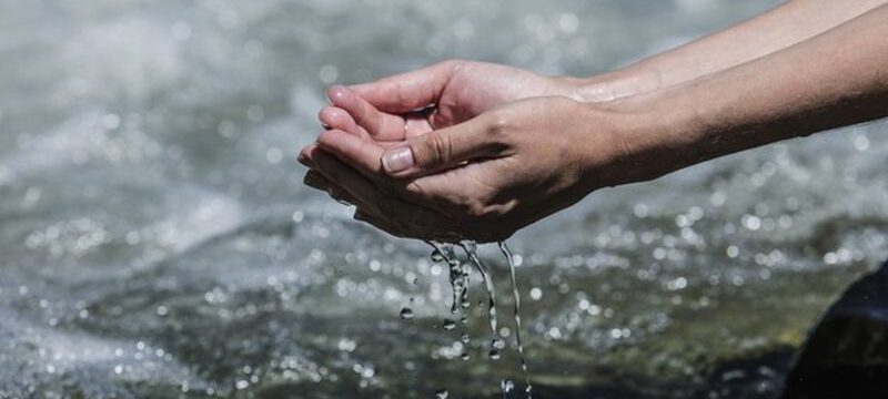 hands-with-clean-water-from-mountain-stream-bubbling_391937-827