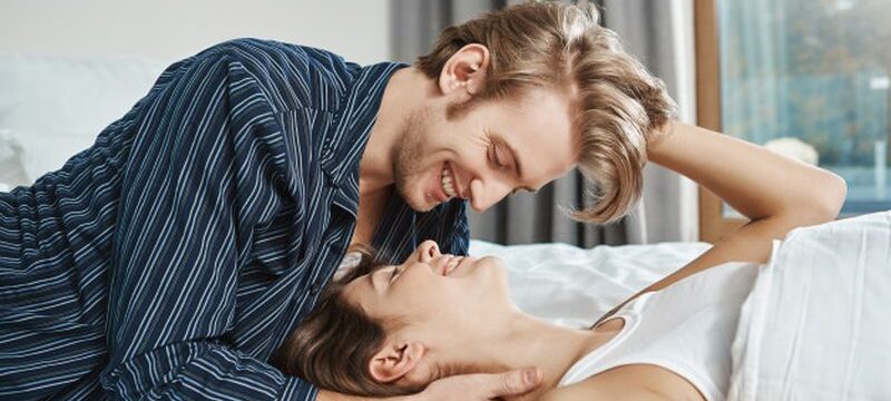 happy-couple-lying-bed-smiling-looking-each-other-with-love-passion-eyes-boyfriend-gives-his-lover-kiss-asks-if-she-wants-coffee-while-breakfast-is-ready_176420-8728